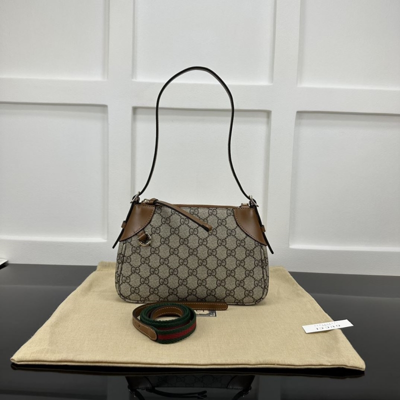 G*u*i top handle bags